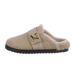 •	Louis Vuitton Suede mules